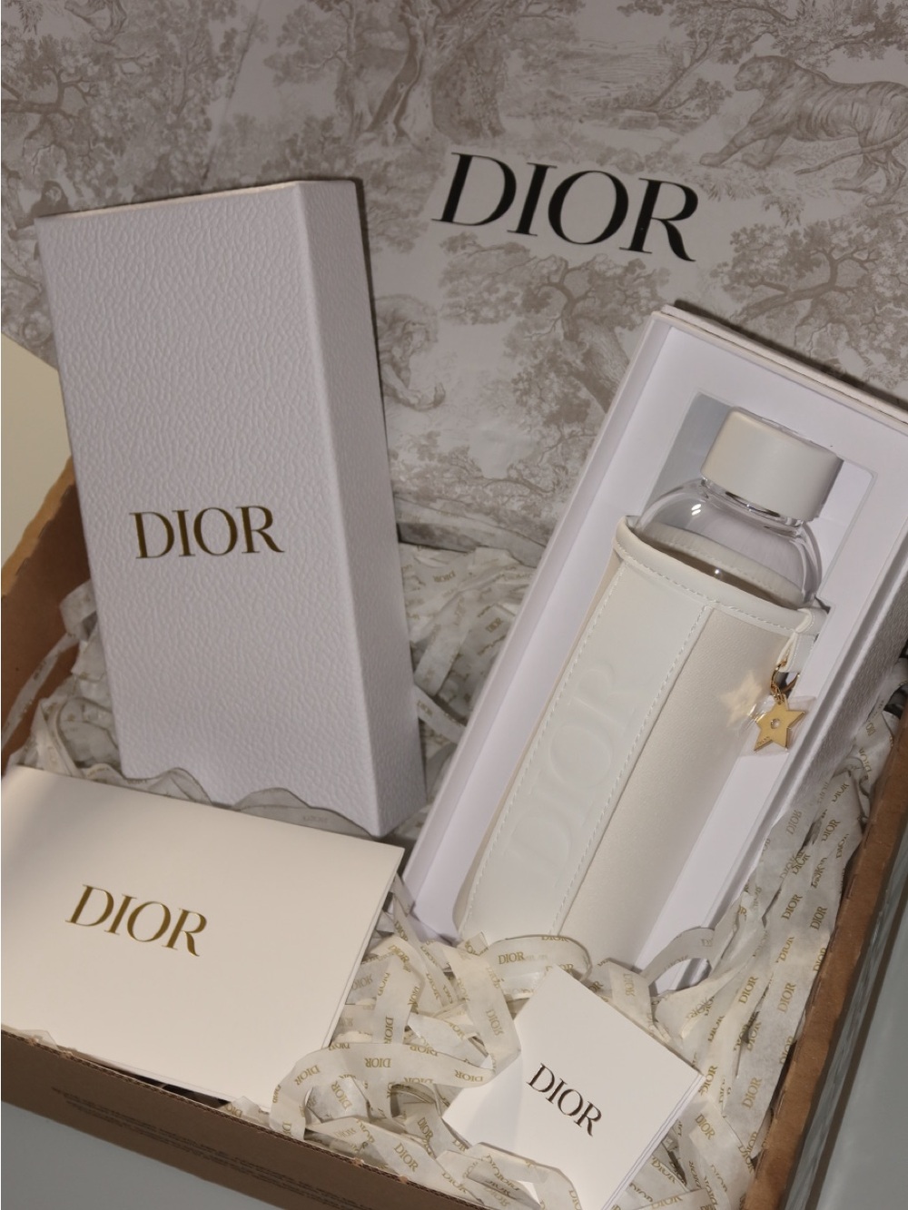 Dior White Leather-Wrapped Bottle with Gold Star Charm